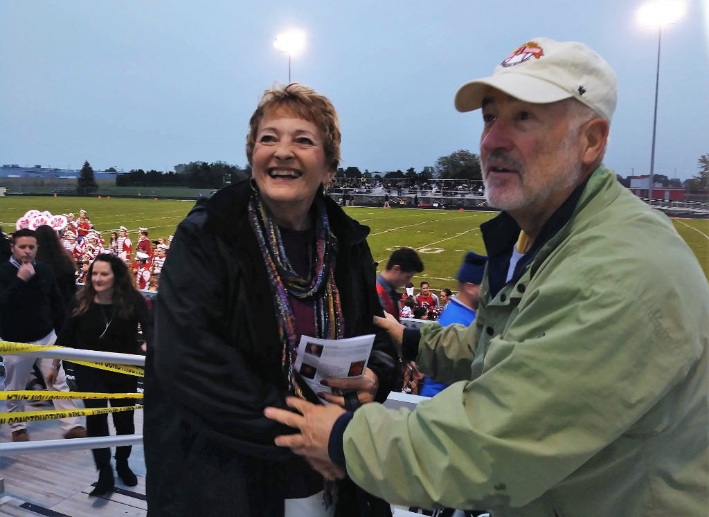 Fri. night BGHS football game. L-R: Cathy (Cromley) Nelson, Ron June. Submitted by Linda (Louys) Misak.