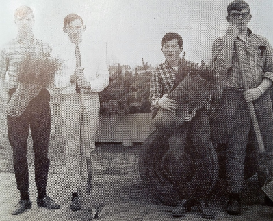 From 1966 Yearbook, Sophomore year. FFA members help out to beautify the school grounds (L-R): Ted Lorenzen, Pat Gaster, Ray Eck (69), ??.
